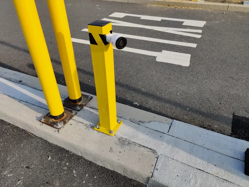 Parking BOXX ALPR camera mounted on a bollard at a parking facility entrance