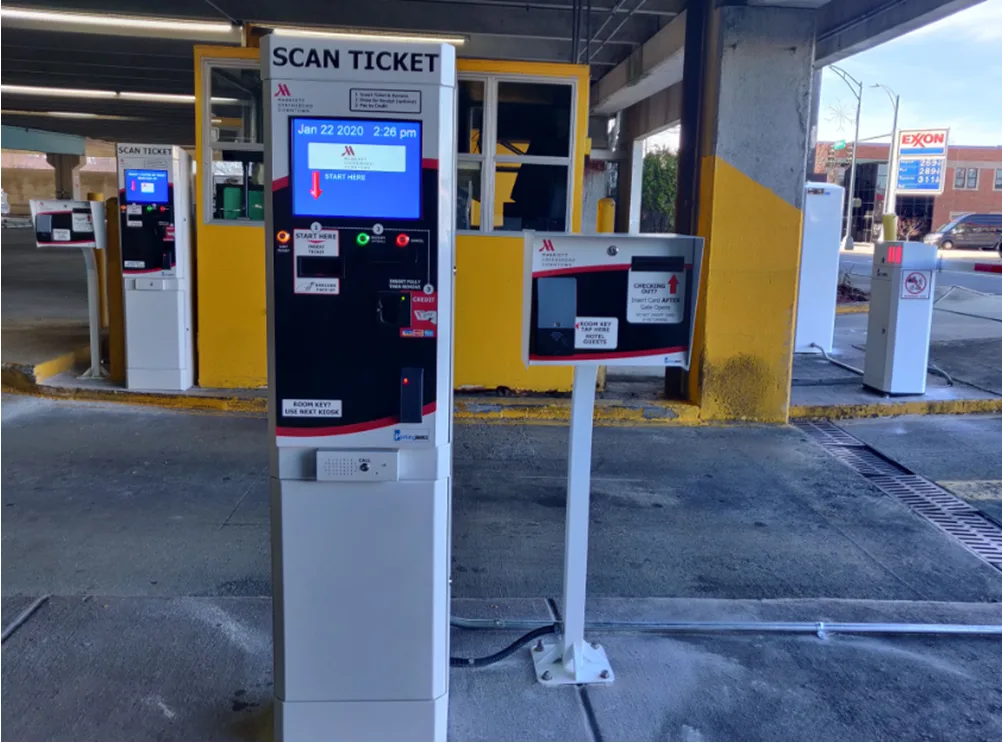 Hotel parking exit lane with guest card reader pedestals
